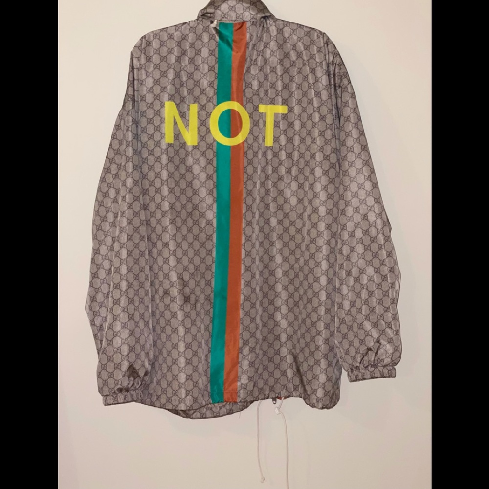 Gucci GG Supreme “Not Fake” print jacket